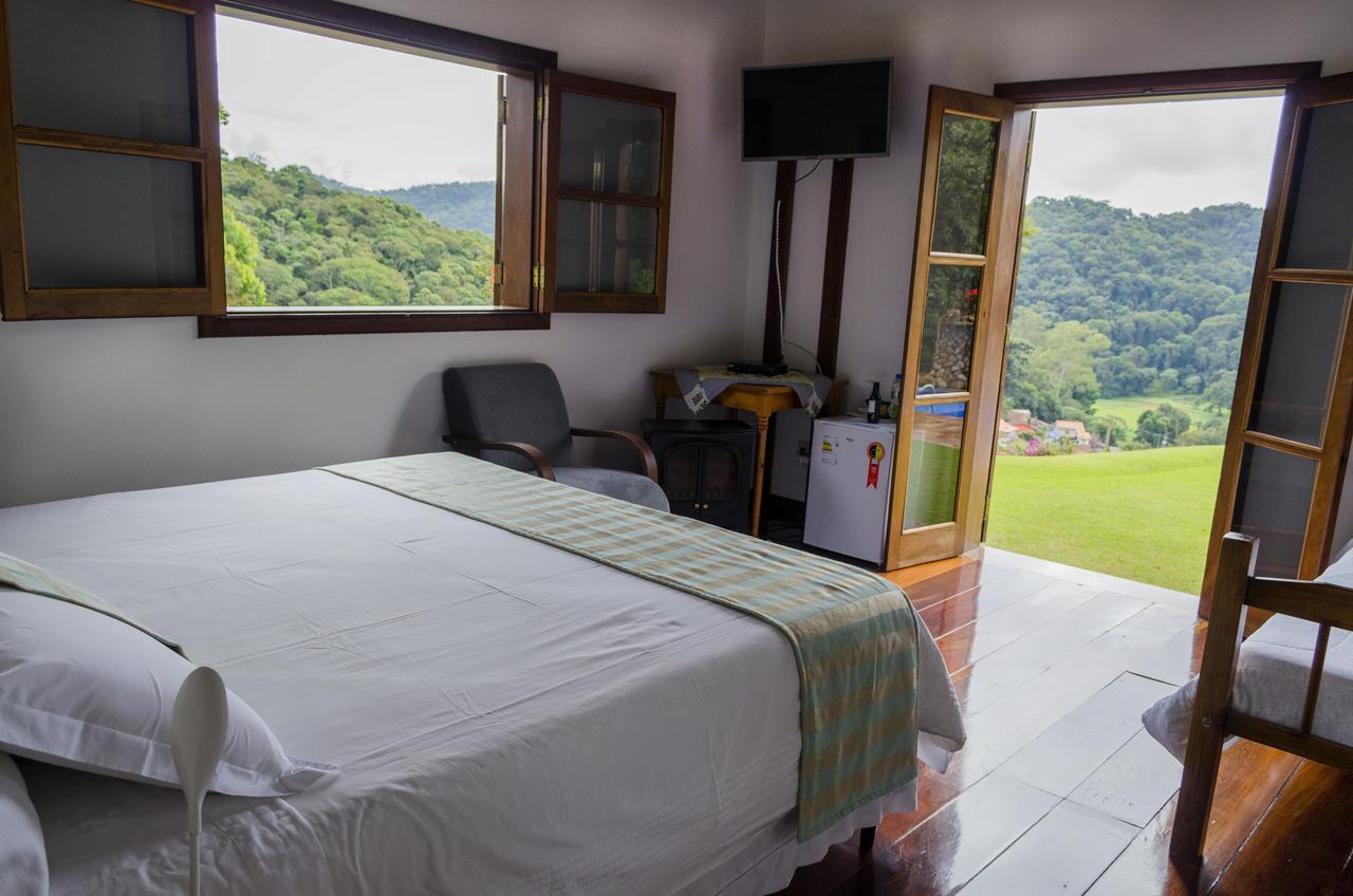 Pousada Casa Da Colina Santo Antônio do Pinhal Esterno foto